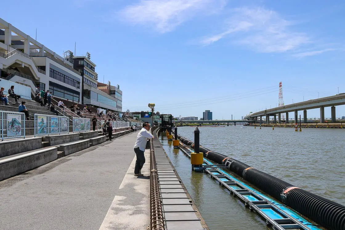 Free seating (or standing) right beside the race course. Picture taken at the Edogawa Boat Race stadium