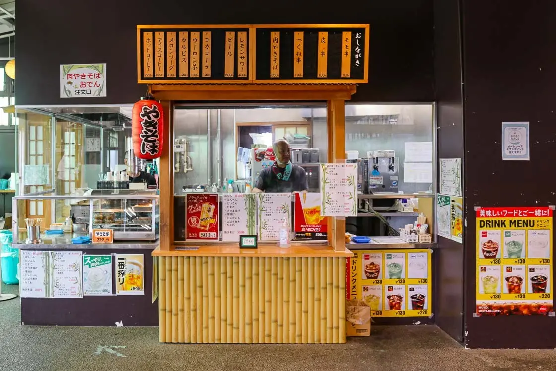 Food stand serving up staples like stir fried noodles and/or grilled meat skewers. Picture taken at the Edogawa Boat Race stadium