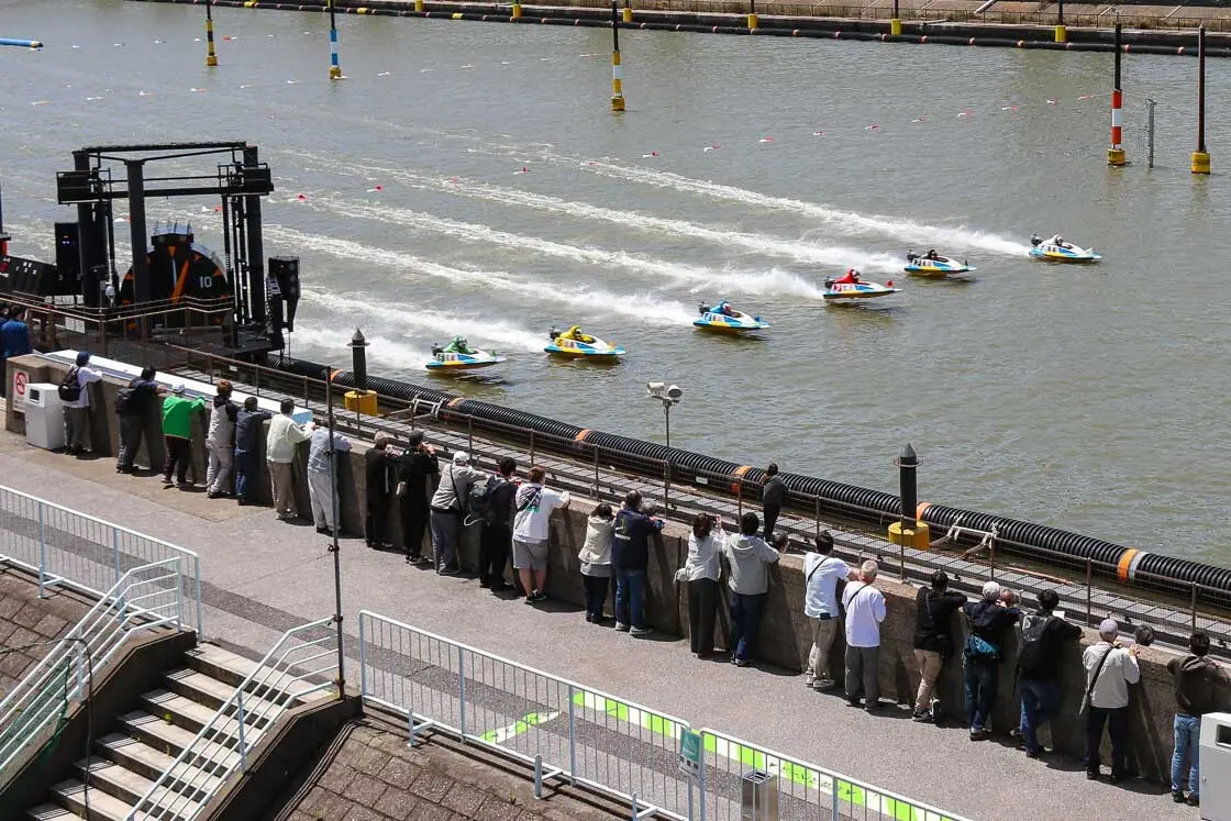 The giant clock on the left counts down to the start. All the racers in this image did their flying starts successfully.